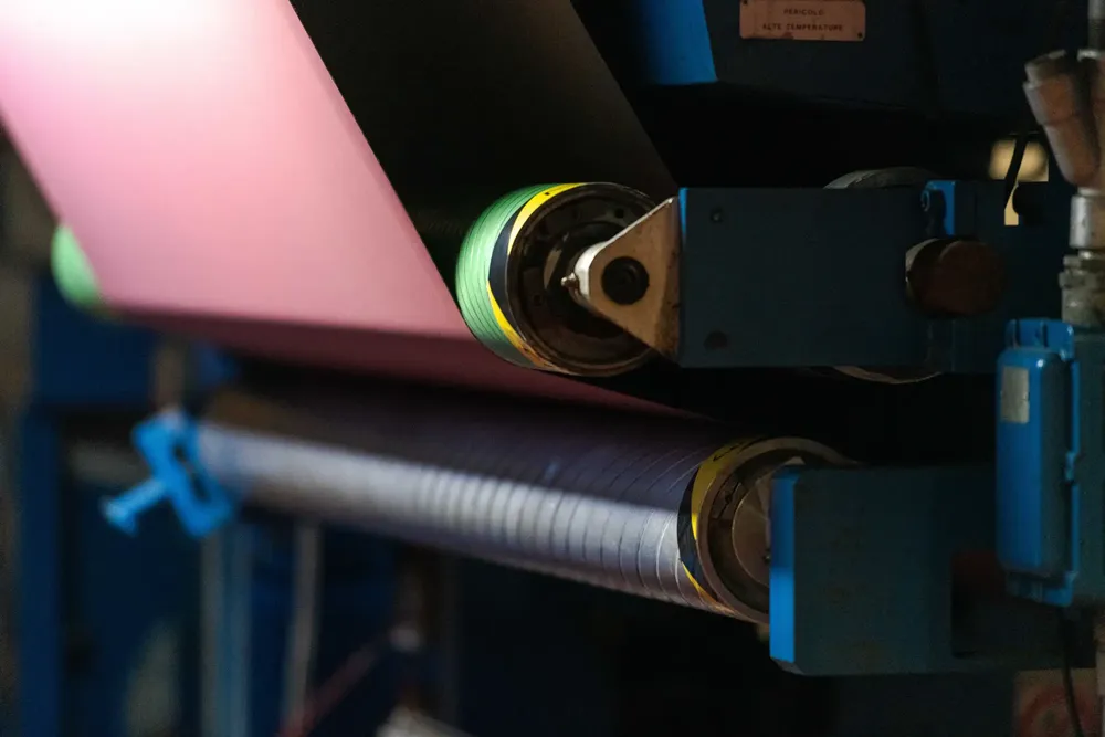 Ambla fabrics rolling through a machine