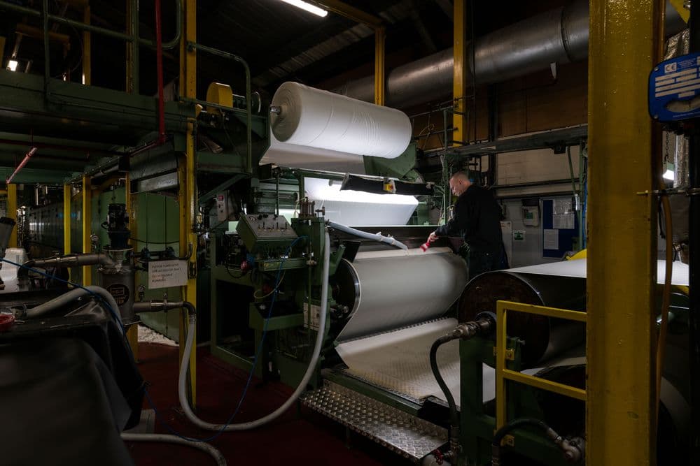 Man working on a fabric