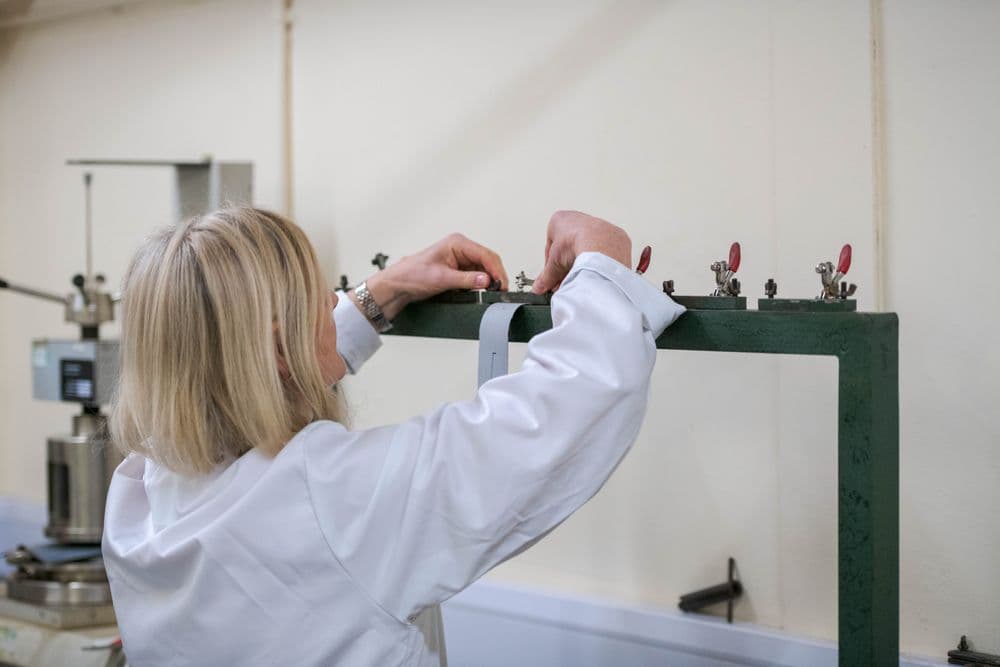 Woman testing fabric